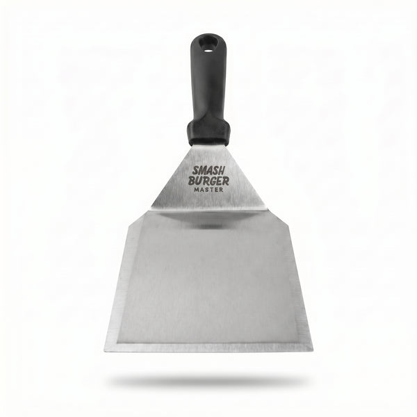 RVS burger spatula van Smash Burger Master met breed rechthoekig mes en zwart kunststof handvat met ronde opening bovenaan. Laser gegraveerd logo op het blad.