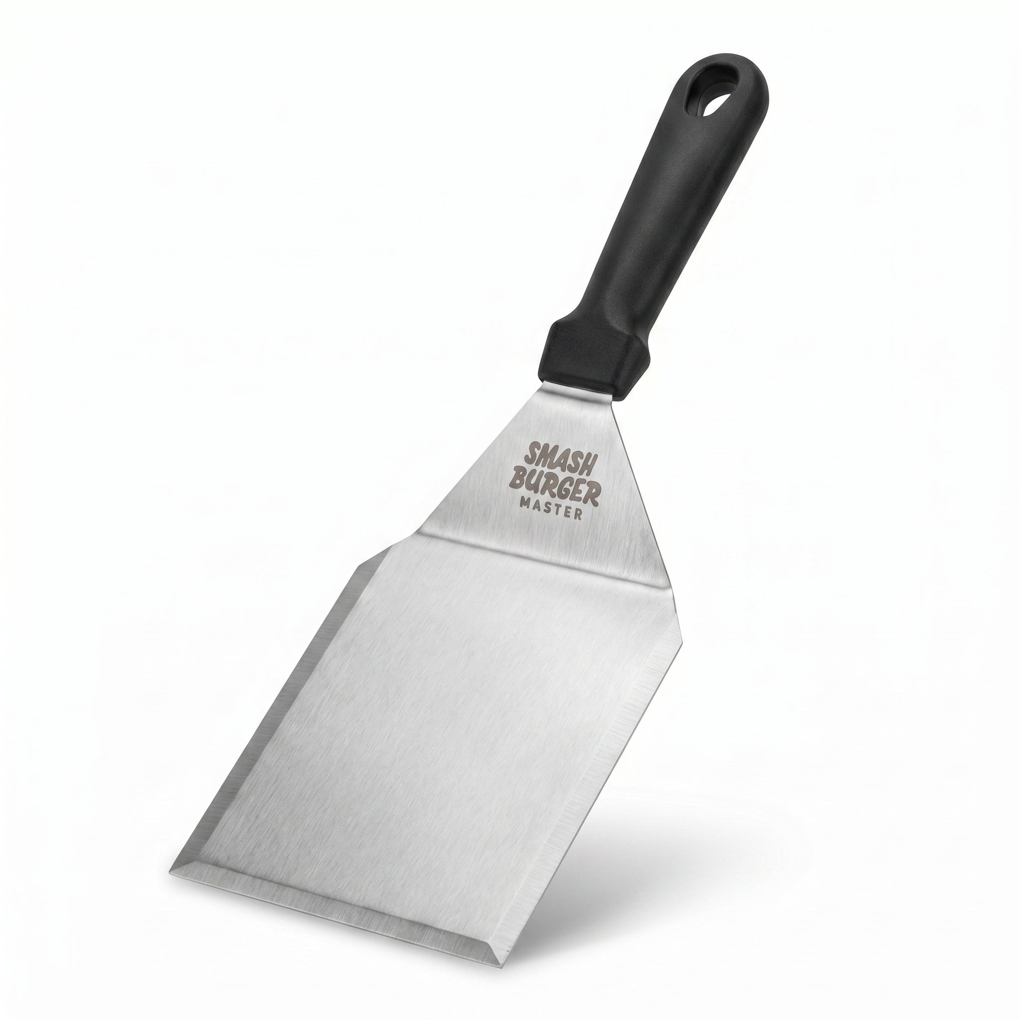 Smash Burger Master spatula diagonaal staand op witte achtergrond, handvat rechtsboven, geborsteld RVS mes linksonder
